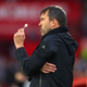 Eduardo Coudet, Head Coach of RC Celta de Vigo, sucking on a lollipop during a stressful match